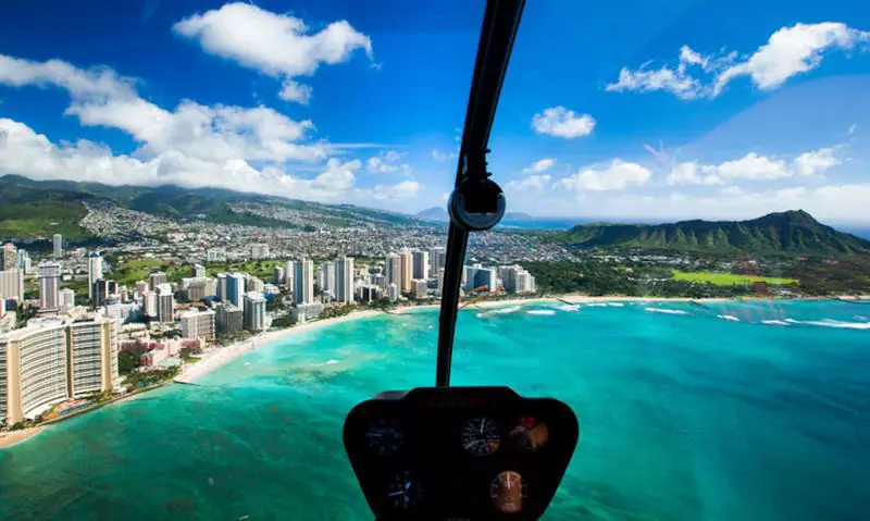 Co-pilot view of Diamond Head through Novictor Helicopters Robinson R44 window